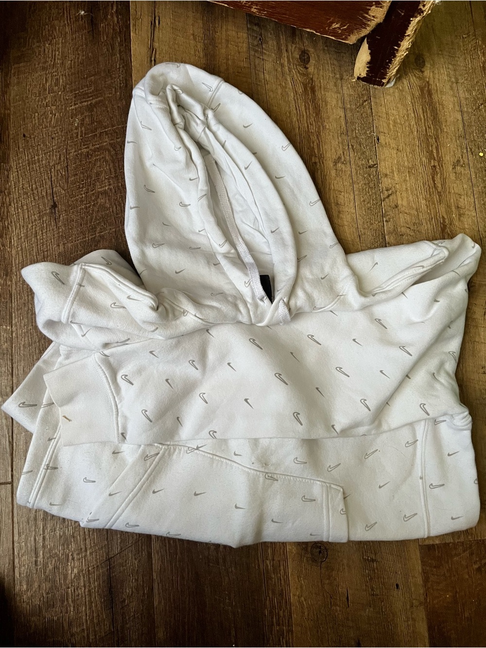 Nike Men’s White Hoodie with Mini Swoosh Pattern